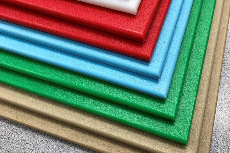 Stack of industrial plastic sheets for agricultural use in Wisconsin.